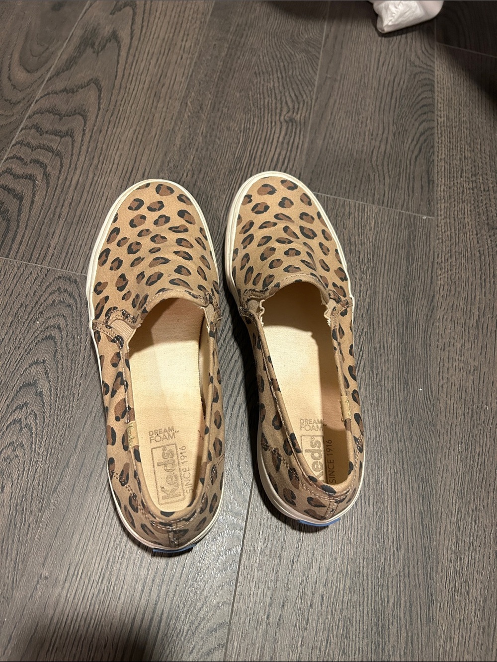 Keds Leopard Print Slip-On Sneakers in Tan and Black